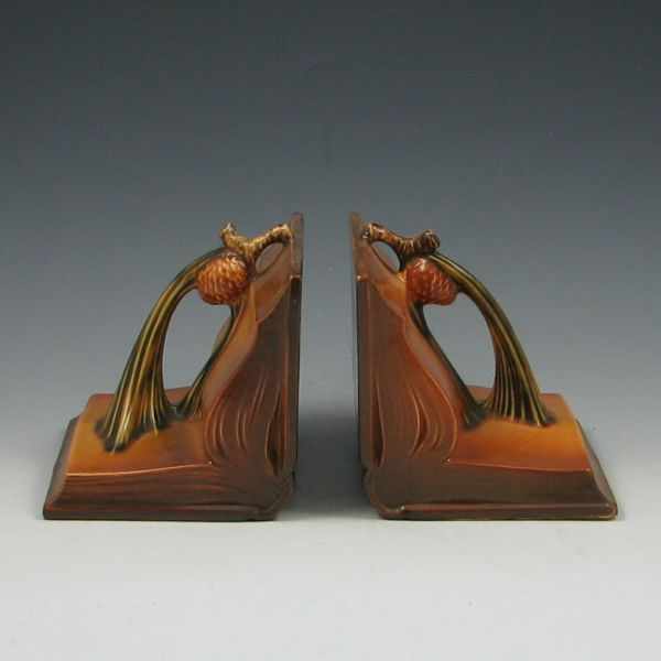 Appraisal: Roseville Pine Cone Bookends brown marked Roseville ''h one with