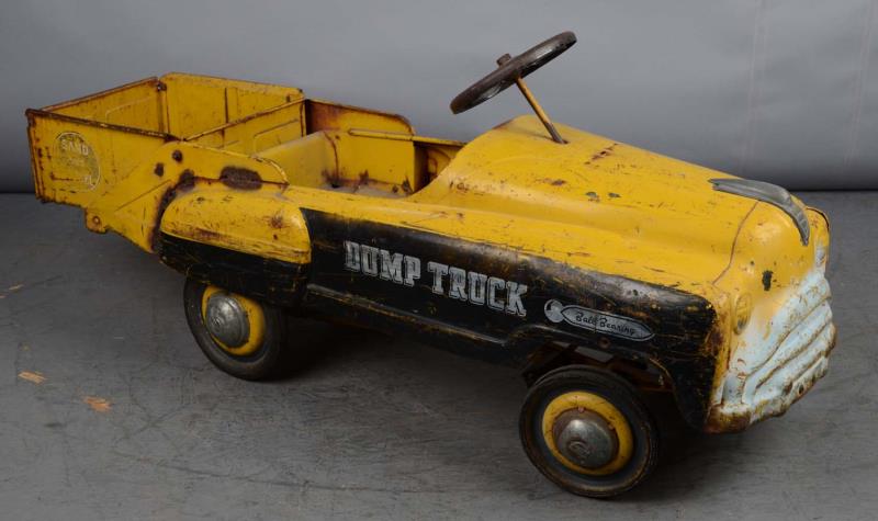 Appraisal: Pressed Steel Murray Dump Truck Pedal Car This yellow and