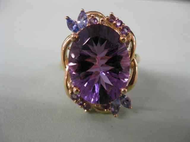 Appraisal: Amethyst Tanzanite Diamond Ring rich colors k yellow gold