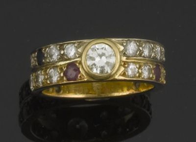 Appraisal: A French diamond and gem set ring Centred with a