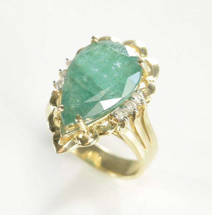 Appraisal: EMERALD DIAMOND AND FOURTEEN KARAT GOLD RING set with six