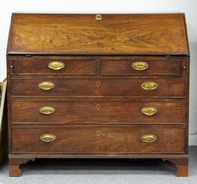 Appraisal: A George III mahogany bureau the fall with three long