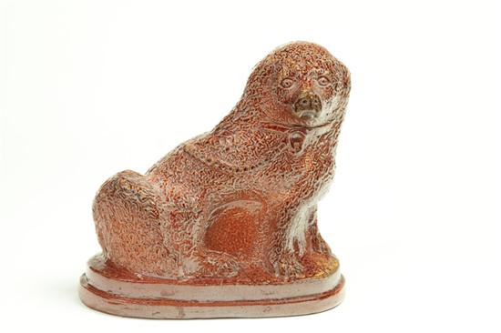 Appraisal: SEWERTILE DOG Ohio early th century Molded spaniel with tooled