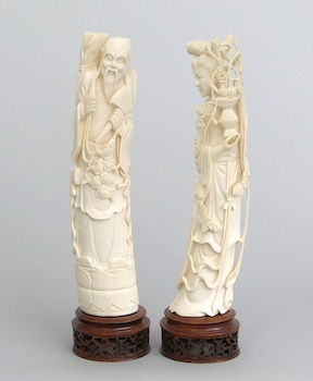 Appraisal: A Pair of Carved Ivory Figures A pair of finely