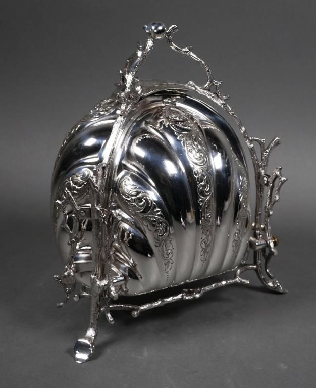 Appraisal: Late th century ornate English silver plated biscuit or bun