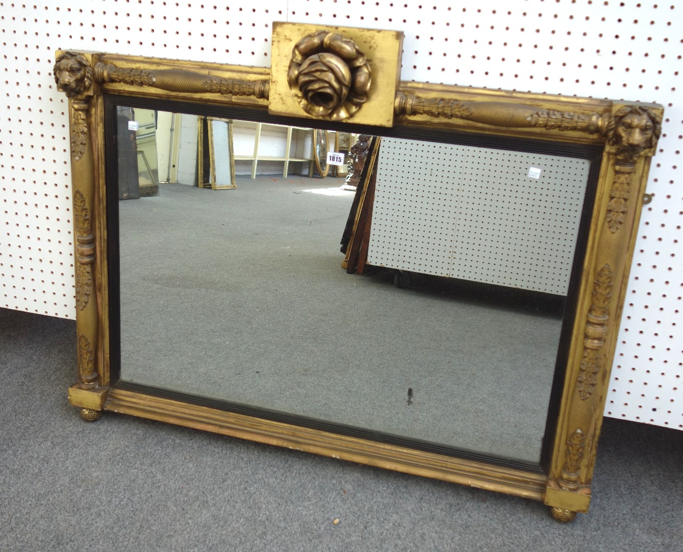 Appraisal: A th century gilt framed rectangular wall mirror with floral