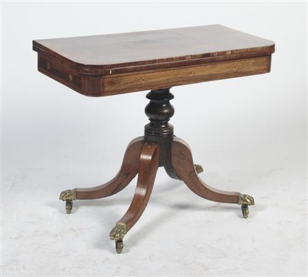 Appraisal: A Regency rosewood and crossbanded games table the rounded rectangular