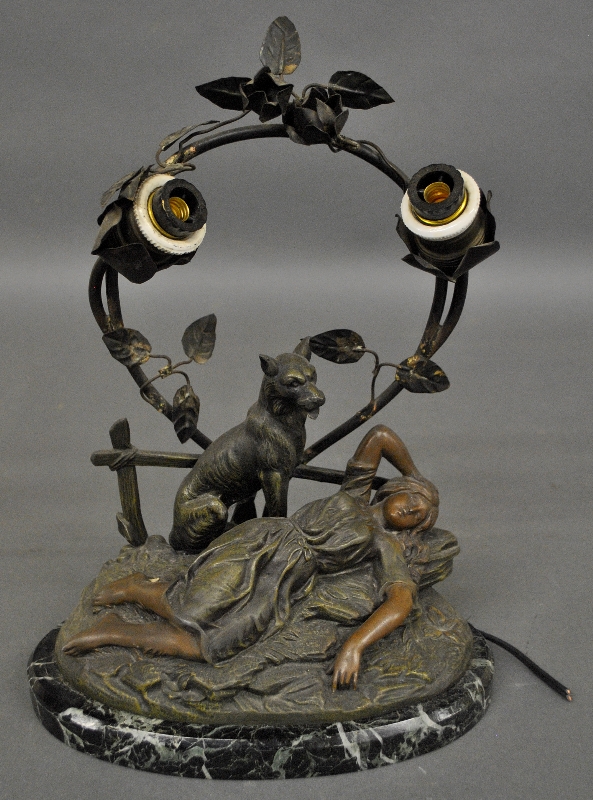 Appraisal: - Spelter metal figural group on an oval green marble