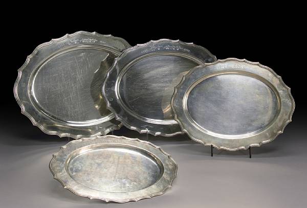 Appraisal: A set of four sterling gradutated plattersMeridan Britannia Co Meridan