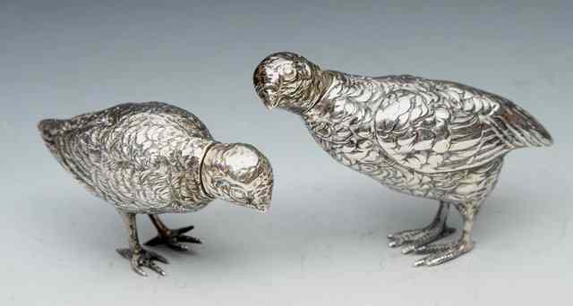 Appraisal: A PAIR OF CONTINENTAL EARLY TH CENTURY SILVER GROUSE each