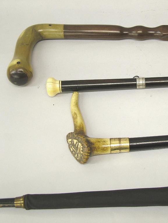 Appraisal: Silver mounted walking cane with ivory knop walking cane with