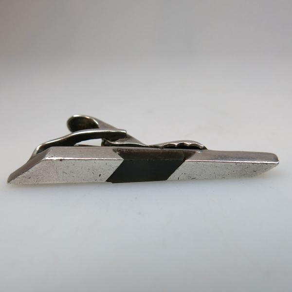 Appraisal: Antonio Peneda Mexican Grade Tie-Clip with inlaid obsidian g weight