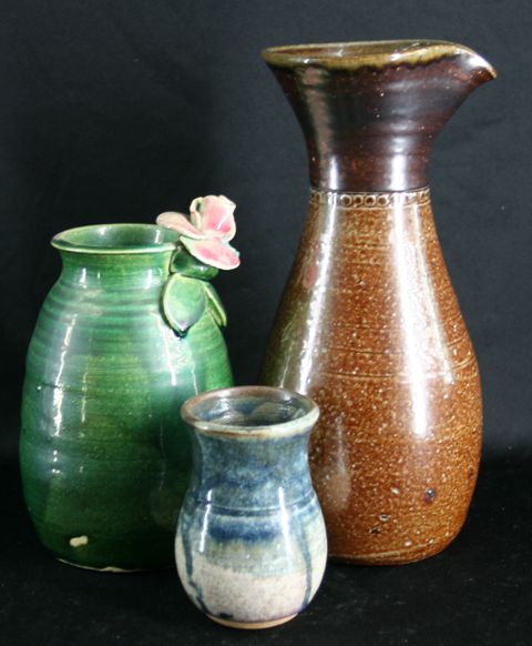 Appraisal: A Bendigo Pottery stoneware decanter and two stoneware posy vases