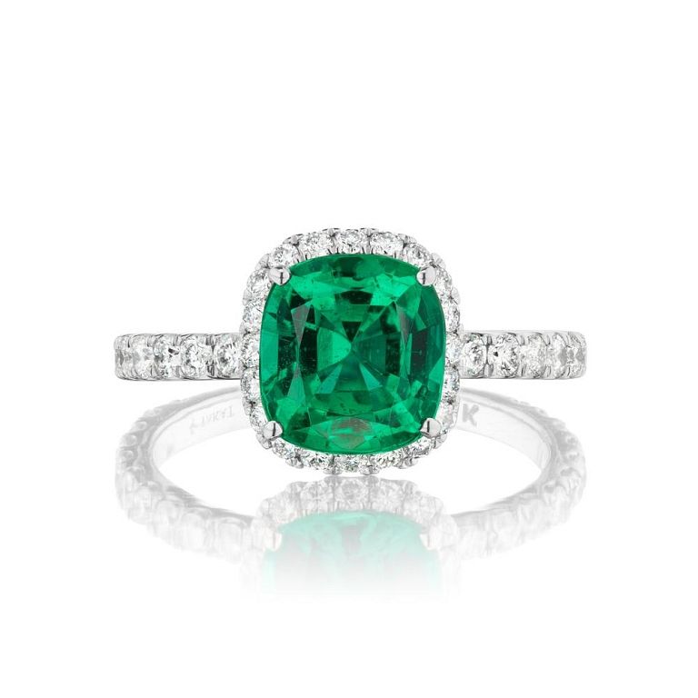 Appraisal: EMERALD AND DIAMOND RING EMERALD AND DIAMOND RING A luxurious