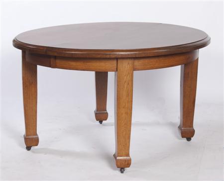 Appraisal: A Victorian oak extending dining table the moulded top over