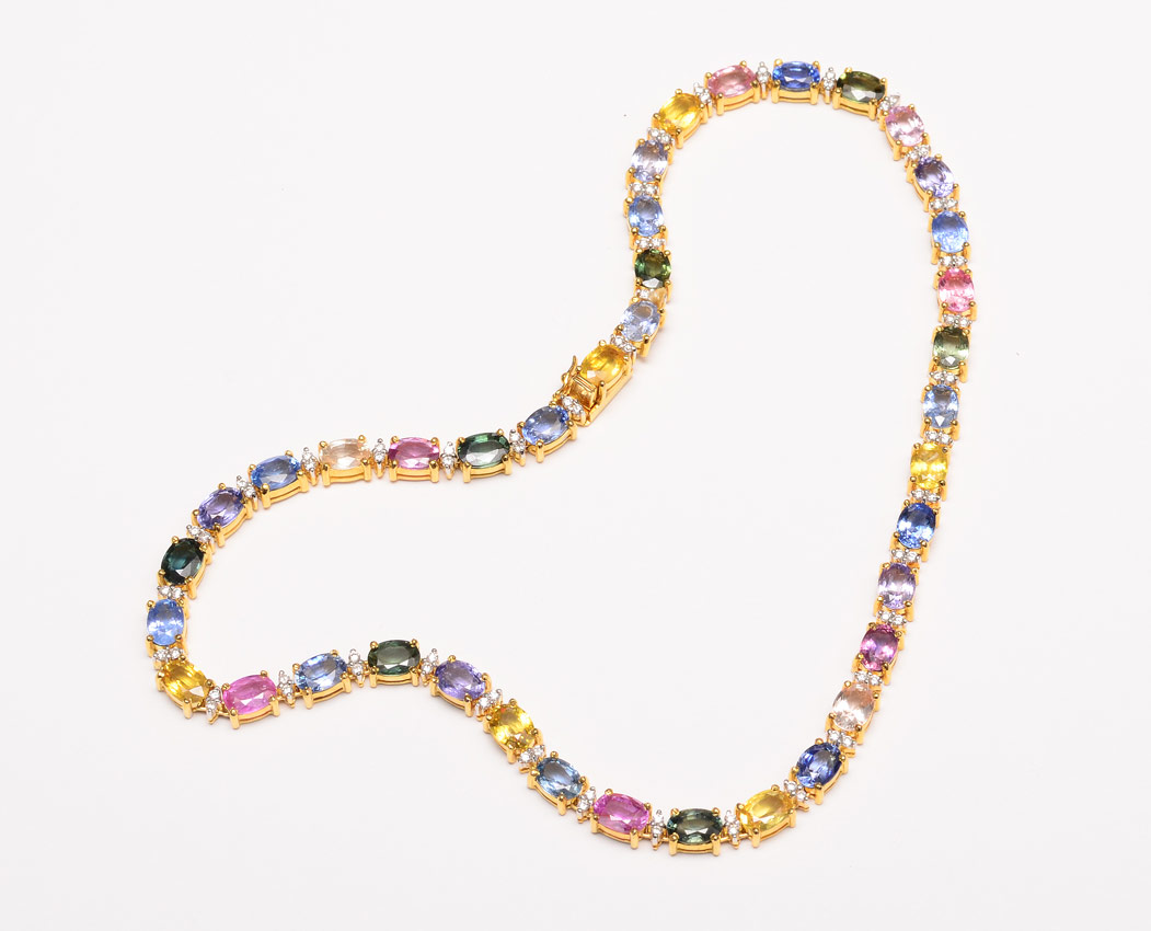 Appraisal: K MULTI COLOR SAPPHIRE NECKLACE oval mixed cut sapphires prong