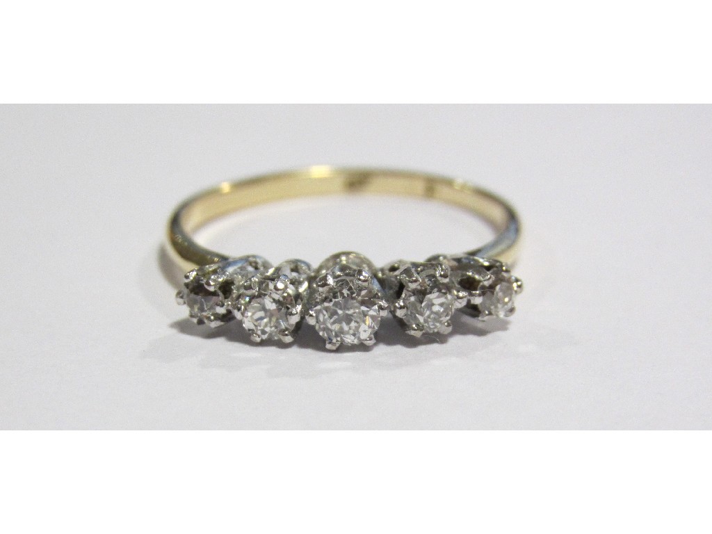 Appraisal: An Edwardian ct gold and platinum diamond five stone ring