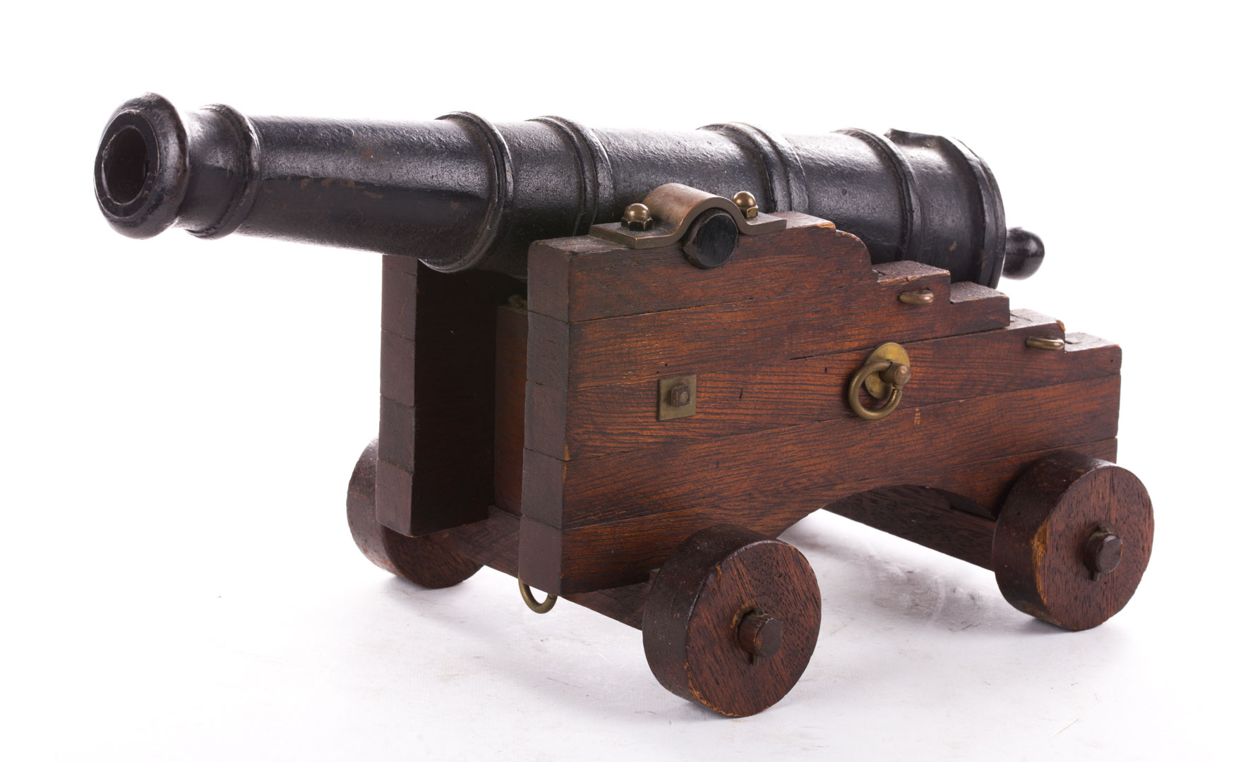 Appraisal: Miniature cast iron and wood naval cannon cast iron barrel