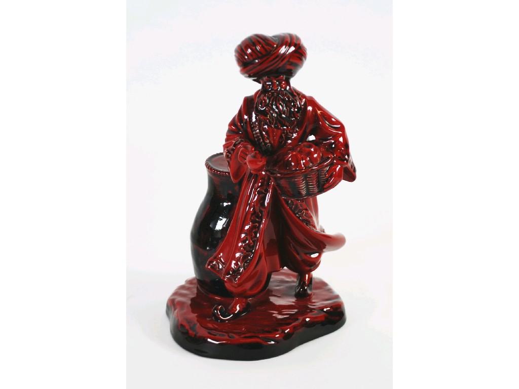 Appraisal: ROYAL DOULTON 'FLAMBE' CHINA FIGURE 'The Lamp Seller' HN bears