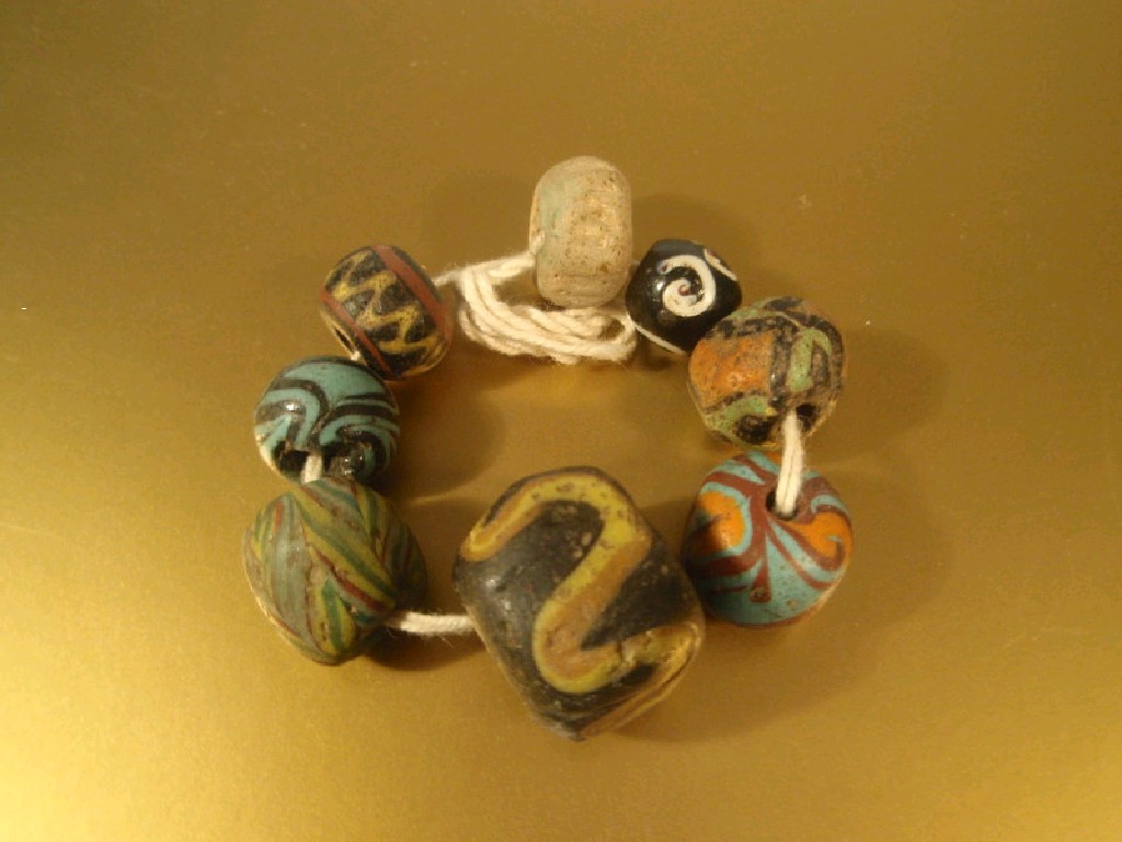 Appraisal: An assorted collection of Roman and Islamic polychrome glass beads