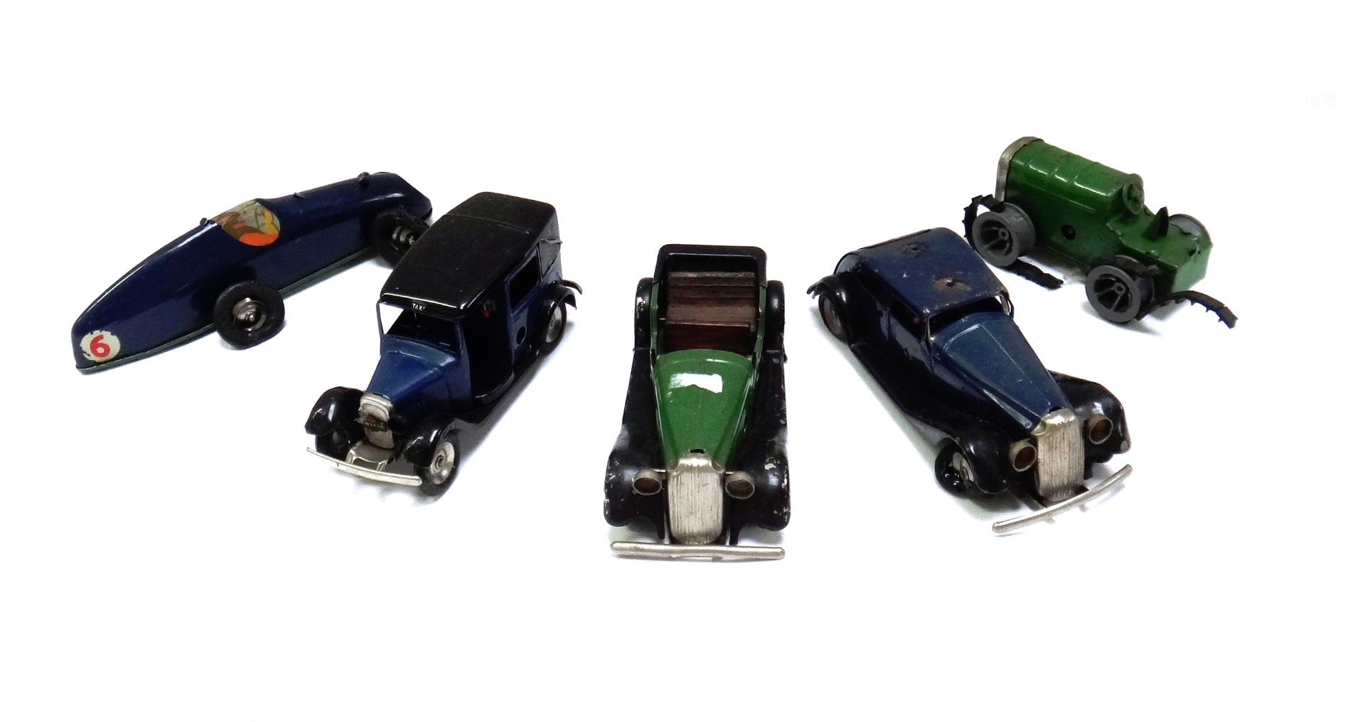 Appraisal: Three Triang Minic clockwork saloon cars a caterpillar tractor and