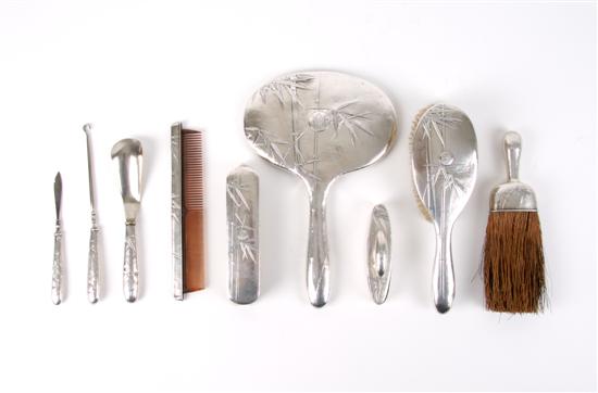 Appraisal: A Japanese Nine-Piece Sterling Silver Dresser Set Length of largest