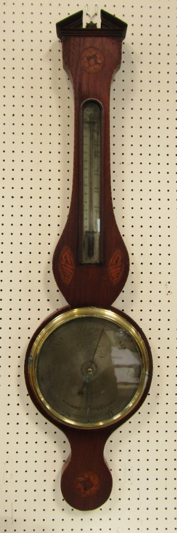 Appraisal: A George III mahogany cased wheel barometer by G Selva