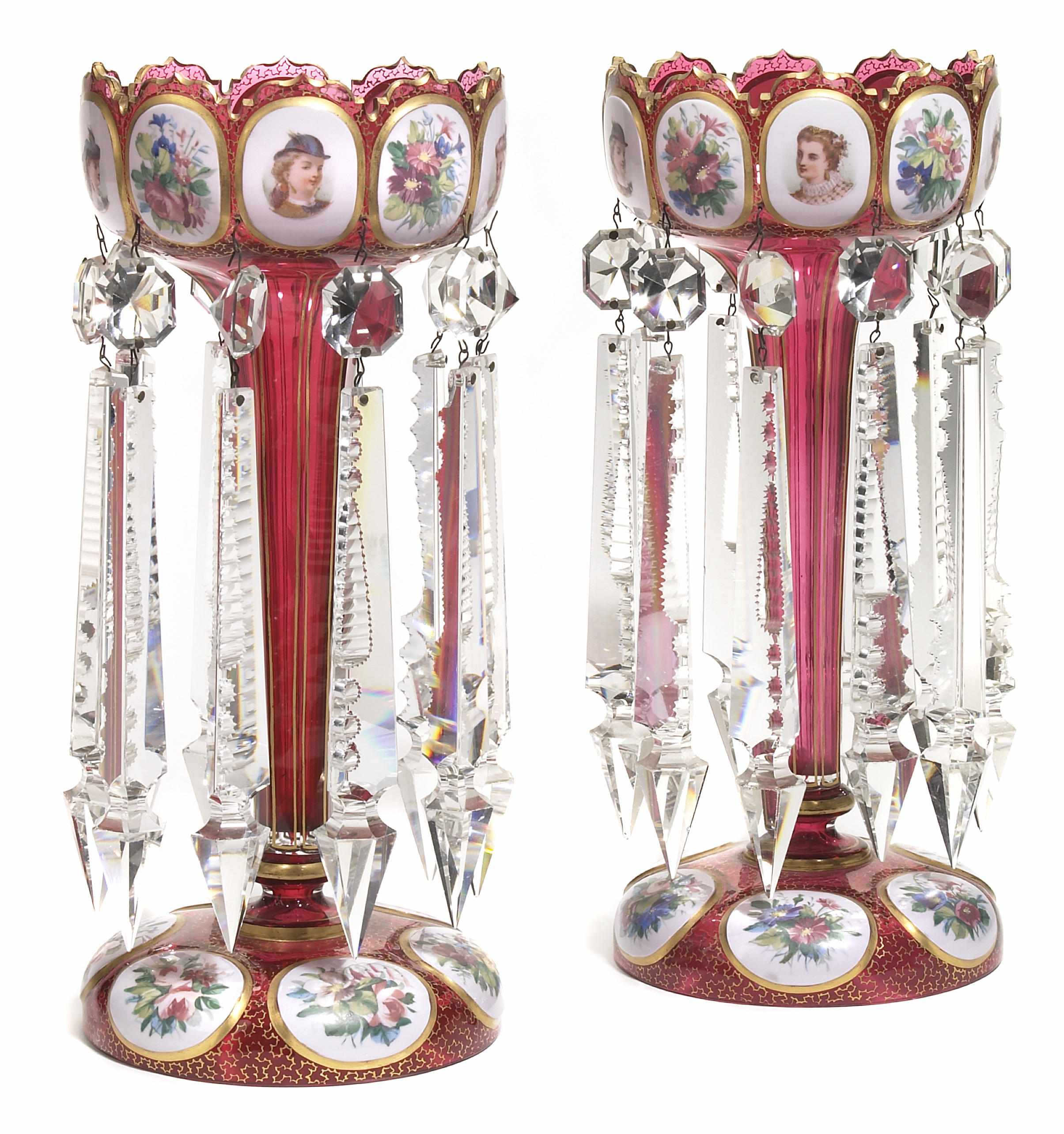 Appraisal: A pair of Bohemian white overlay and cranberry glass lusters