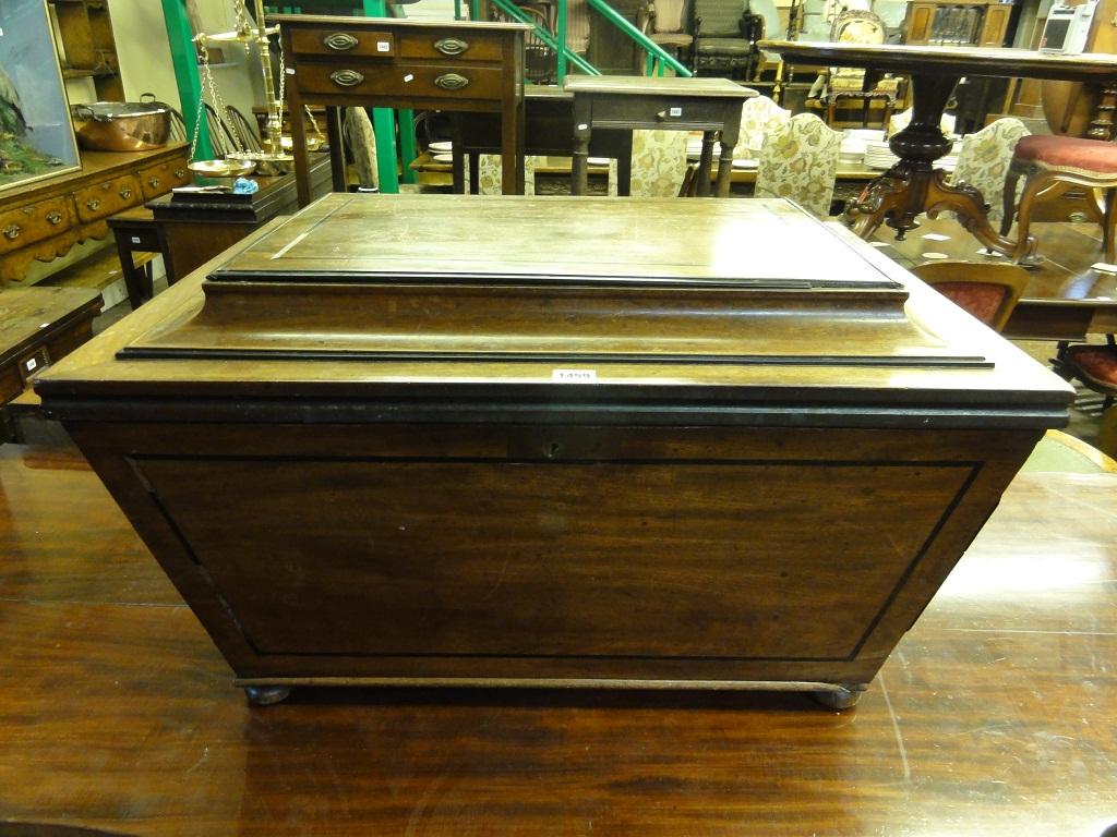 Appraisal: A Regency mahogany wine cooler of sarcophagus form with inlaid