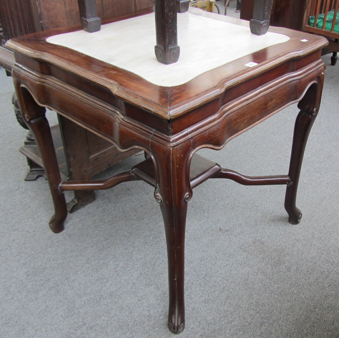 Appraisal: An early th century Chinese hongmu square centre table with