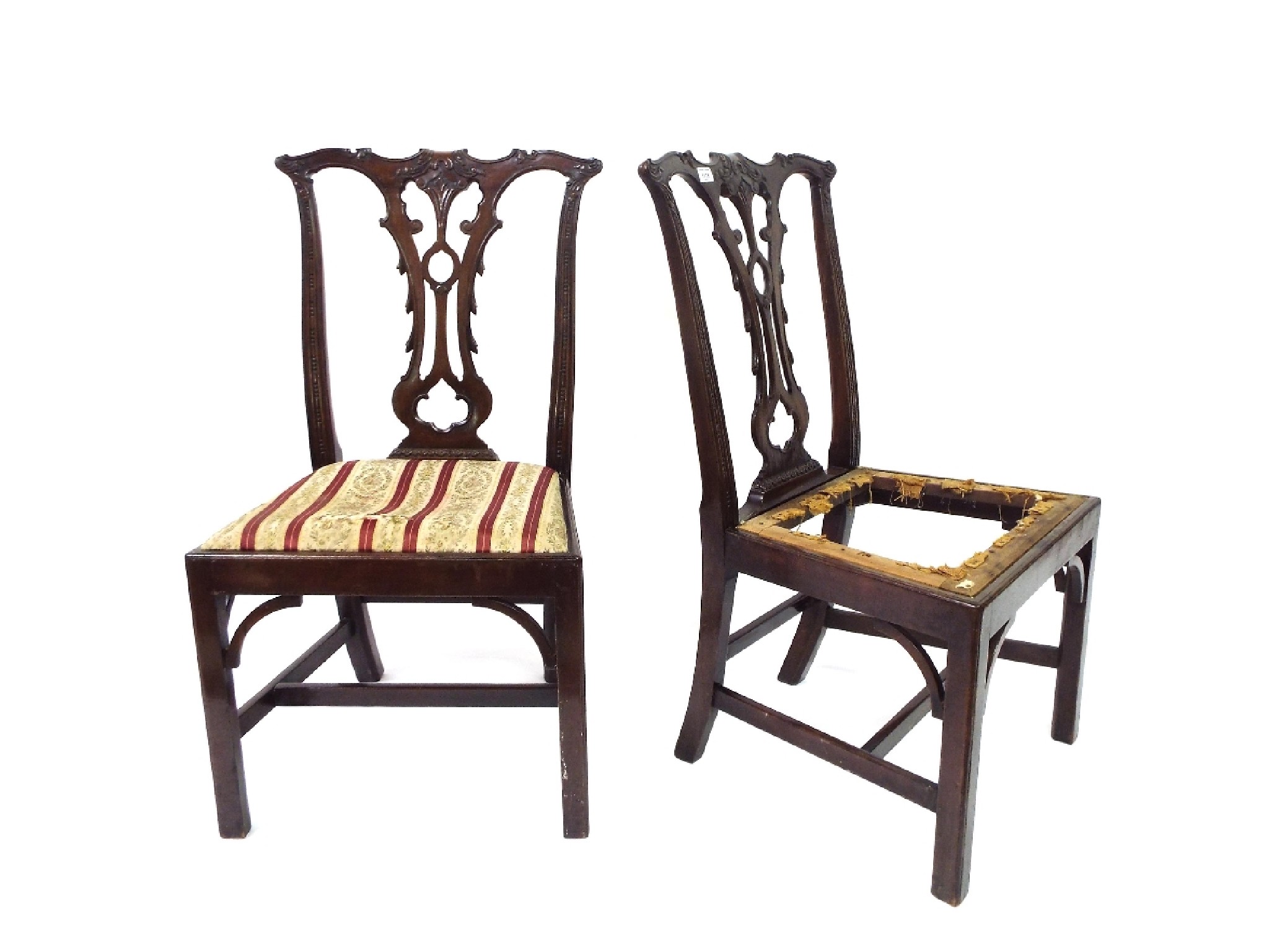 Appraisal: Pair of Chippendale style mahogany dining chairs with typical pierced