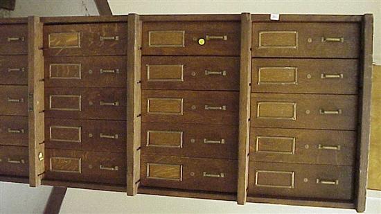 Appraisal: Oak four-section filing cabinet twenty drawers total each with brass