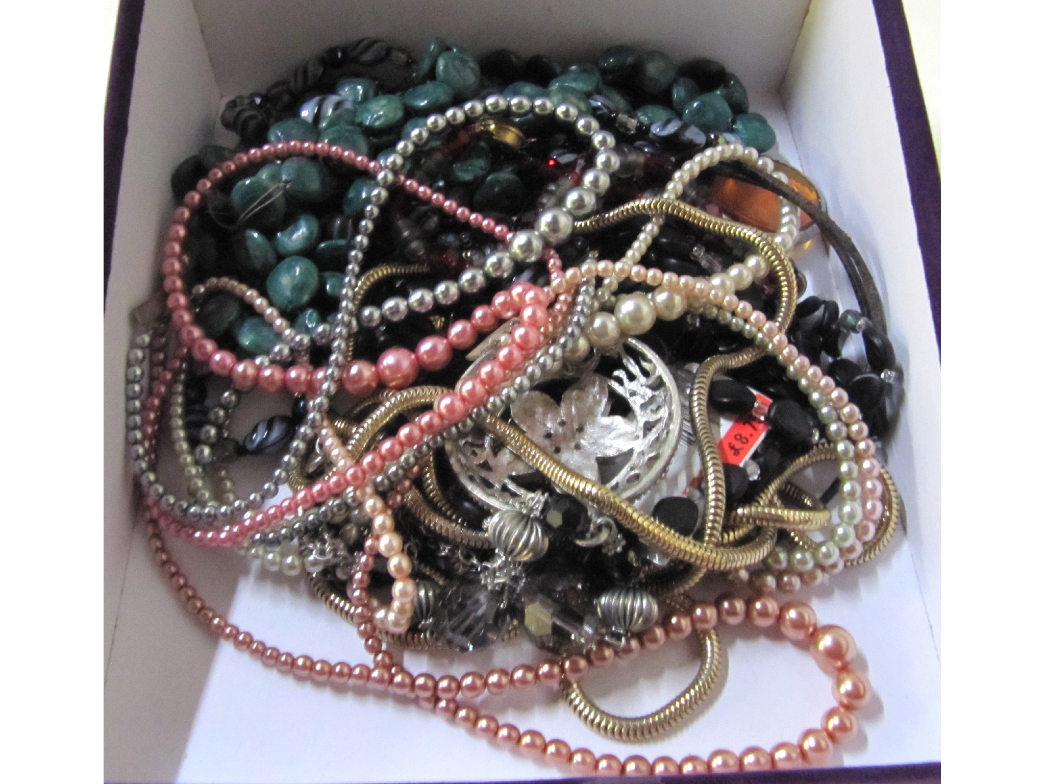 Appraisal: A box of costume beads etc