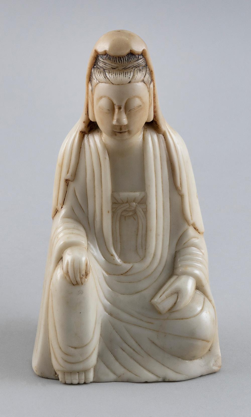 Appraisal: CHINESE CARVED SOAPSTONE FIGURE OF A SEATED GUANYIN LATE MING-QING