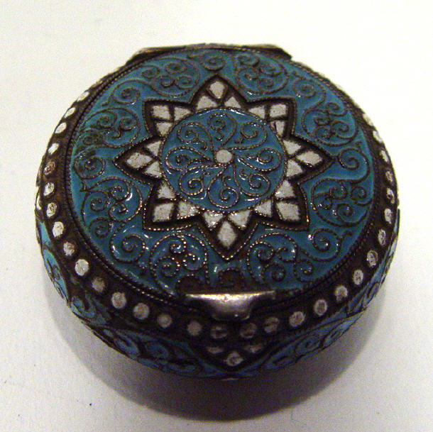 Appraisal: Norwegian grade silver pillbox with chased and blue enamelled decoration