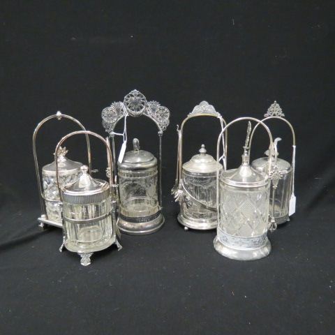 Appraisal: Victorian Pickle Castors various clear pattern glass inserts in silverplate