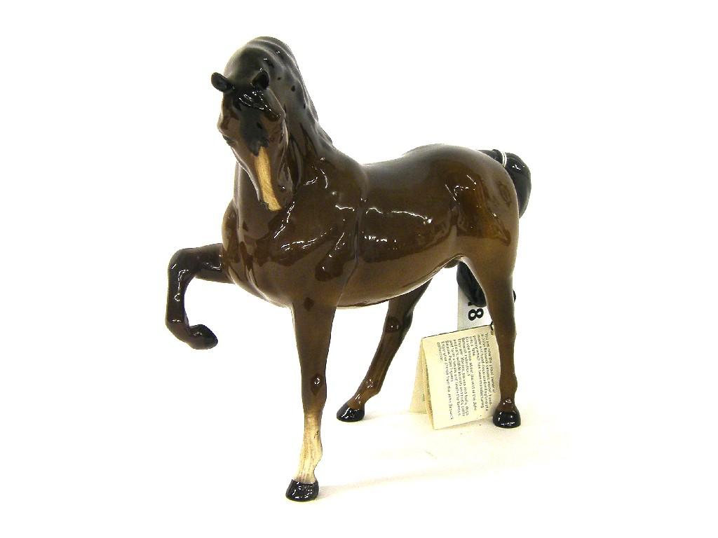 Appraisal: Beswick brown horse with a raised front leg bears original