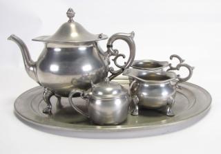 Appraisal: Description Antique Pewter Tea Set Poole pewter tea pot creamer