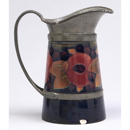 Appraisal: A Moorcroft pewter mounted Pomegranate jug c - cm h