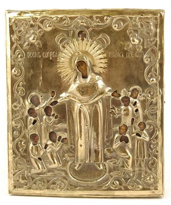 Appraisal: A Russian icon with painted faces and an embossed sheet