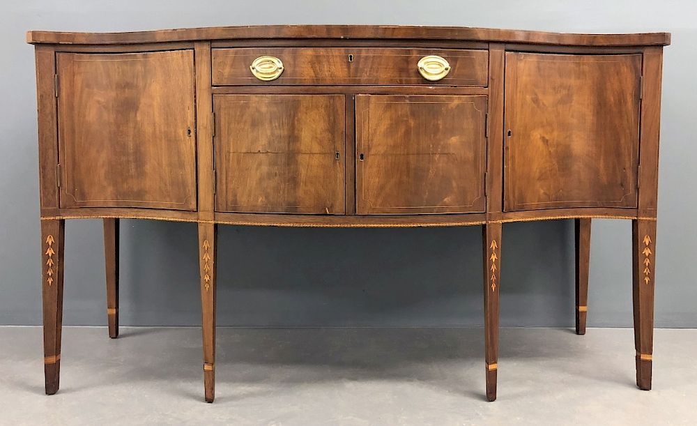 Appraisal: Baltimore Hepplewhite Style Serpentine Sideboard Baltimore Hepplewhite style mahogany serpentine