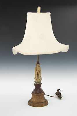 Appraisal: A Chinese Carved Hardstone Quan Yin Lamp A lamp with