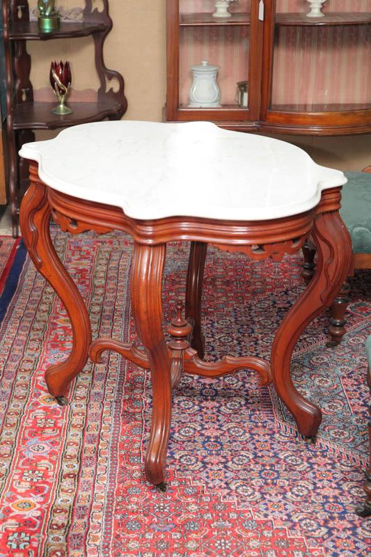 Appraisal: VICTORIAN MARBLE TOP TABLE Walnut with a white turtle shaped