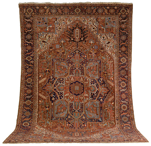 Appraisal: Roomsize Heriz rug ca with central medallion on a red