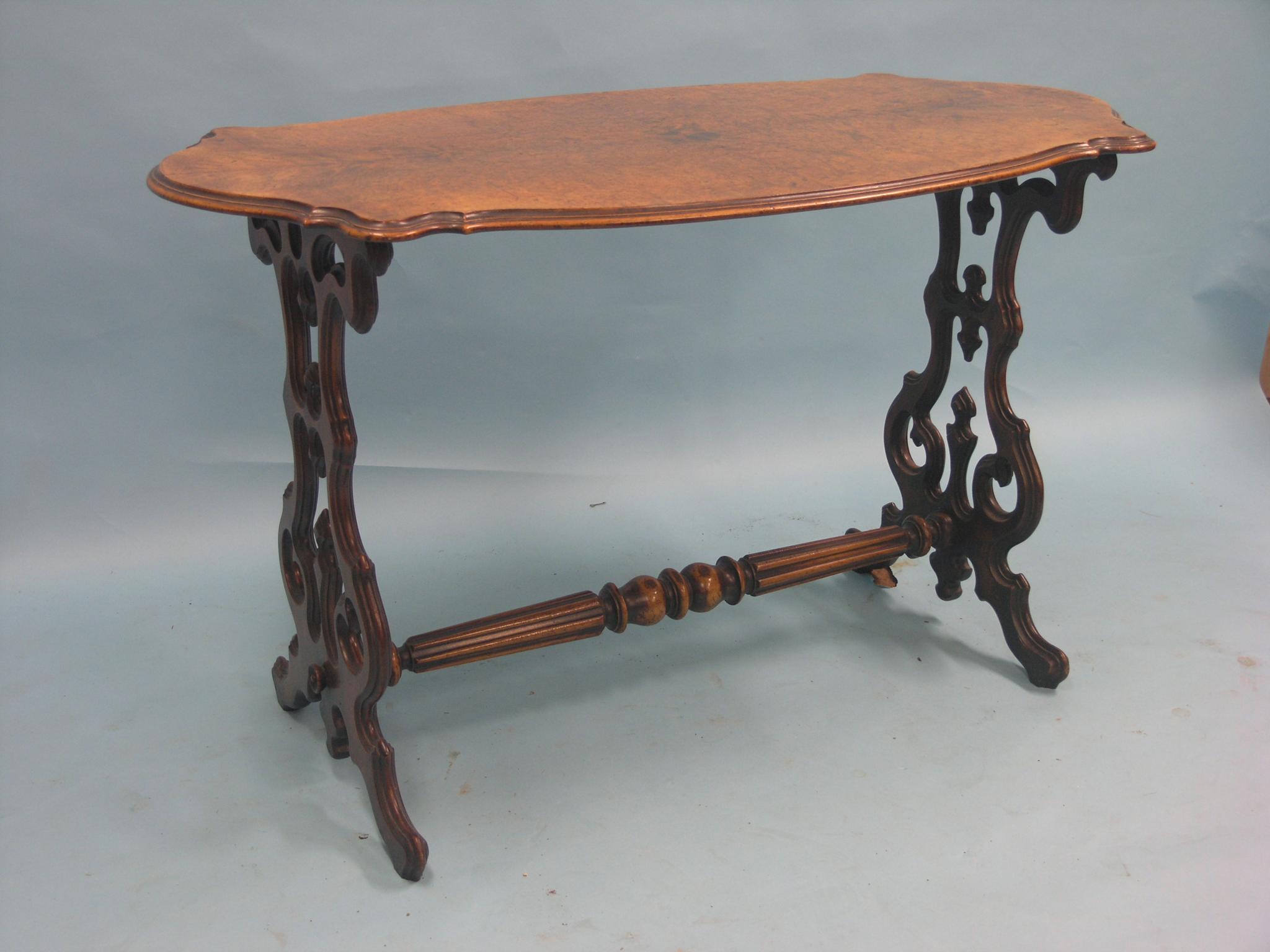 Appraisal: A Victorian burr walnut side table quarter-veneered top of serpentine-shape