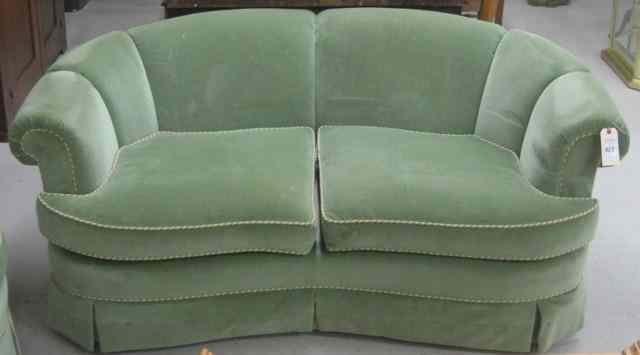 Appraisal: TRADITIONAL STYLE GREEN VELVET LOVESEAT one of a pair