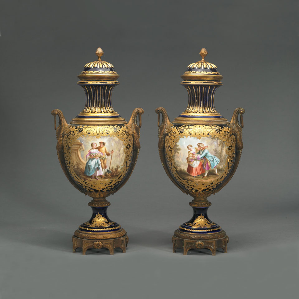 Appraisal: Pair of Gilt Bronze Mounted S vres Vases and Covers