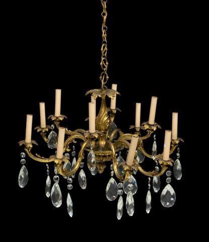 Appraisal: Gilt metal twelve-light chandelier the foliate vasiform standard issuing twelve