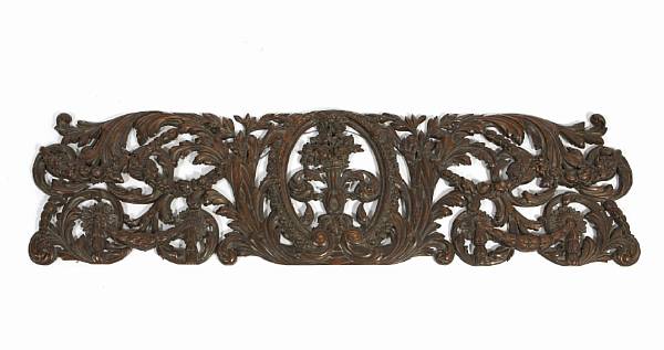 Appraisal: A Continental carved walnut architectural panel height in width ft