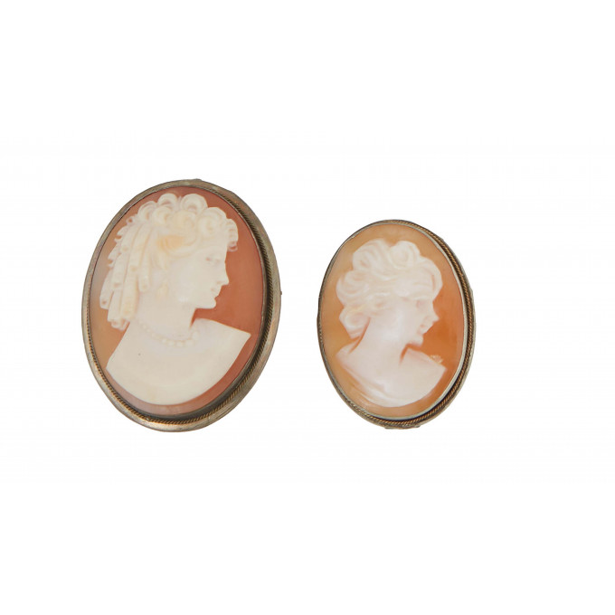 Appraisal: Two Cameo Pendant Brooches in silver mounts H - in